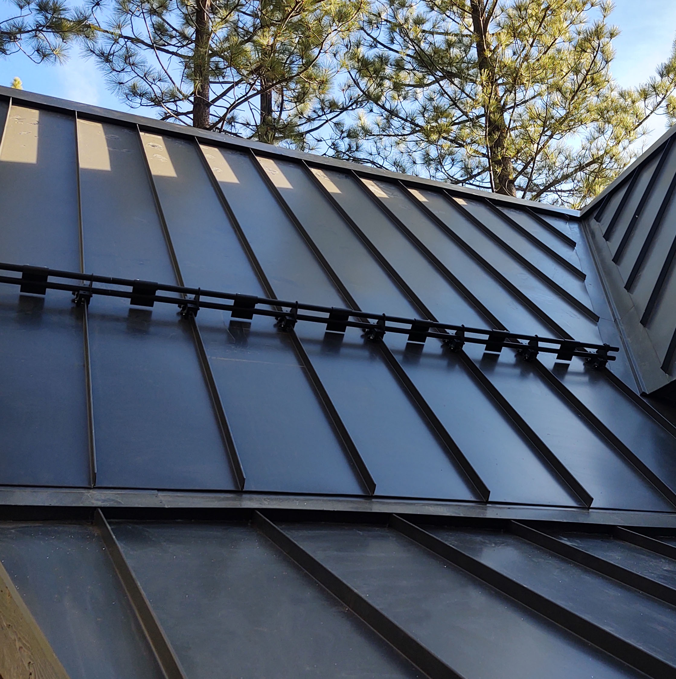 Standing Seam vs Metal Shingles for Stones Crossing Homes